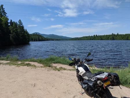 Motorcycle on banks of Franklin Falls Pond