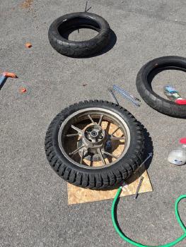 Motorcycle Tires laying on tarmac