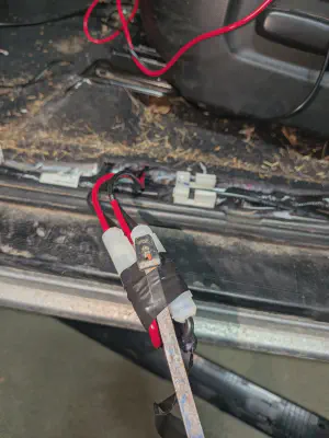 power cables fished out from under seat